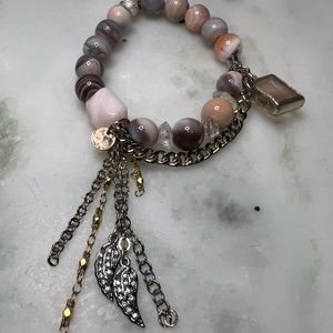 Love Thirteen bracelet… peach gray. Two Angel wing charms with pave diamonds.